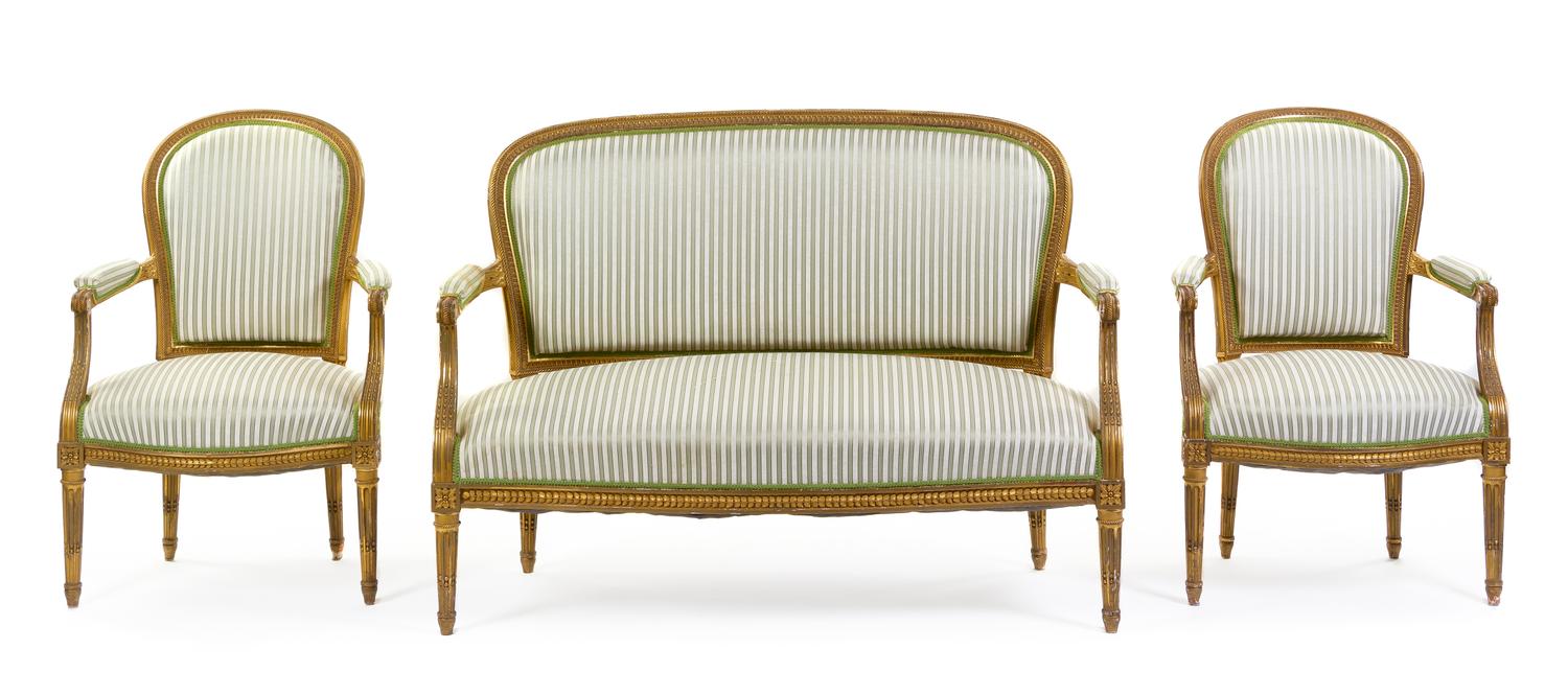 A Louis XVI Style Giltwood Three-Piece Parlor Suite by François Linke (1855-1946)