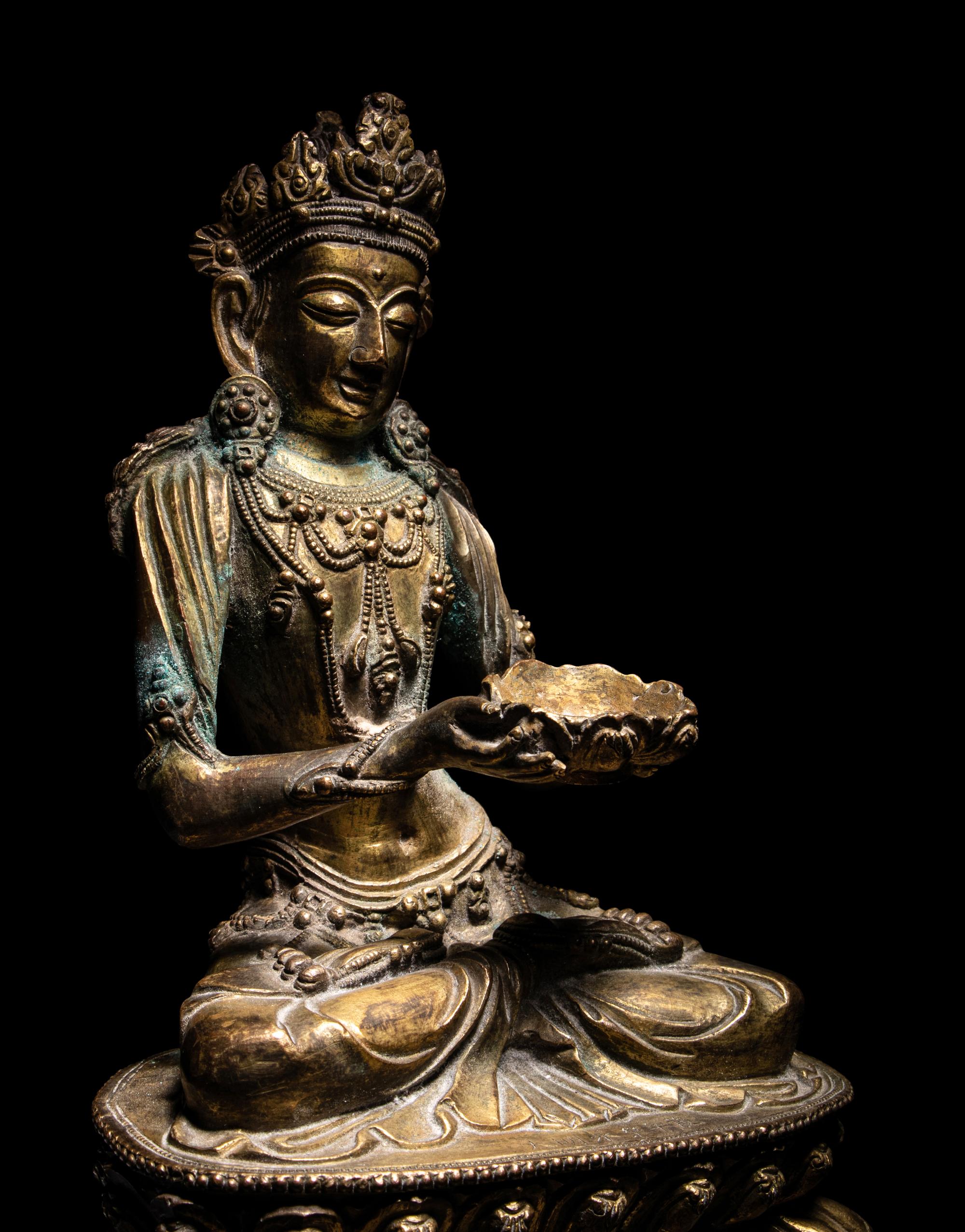 An Unusual Gilt Bronze Figure of Seated Maitreya