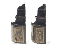 A pair of diminutive Regency style japanned hanging corner cupboards, 19th century