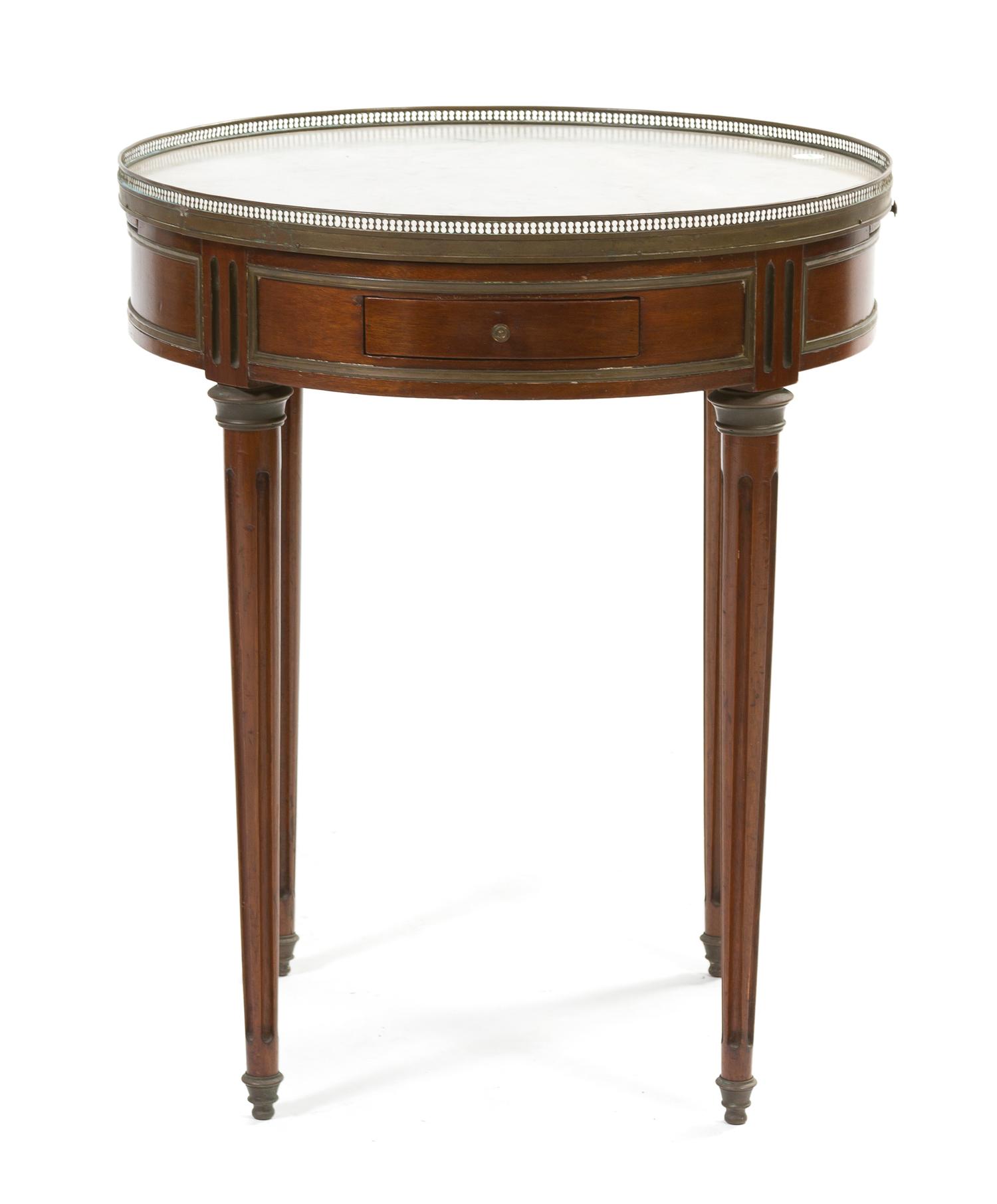 A Louis XVI Style Mahogany Bouillotte Table, Height 28 1/4 x diameter 23 1/2 inches.