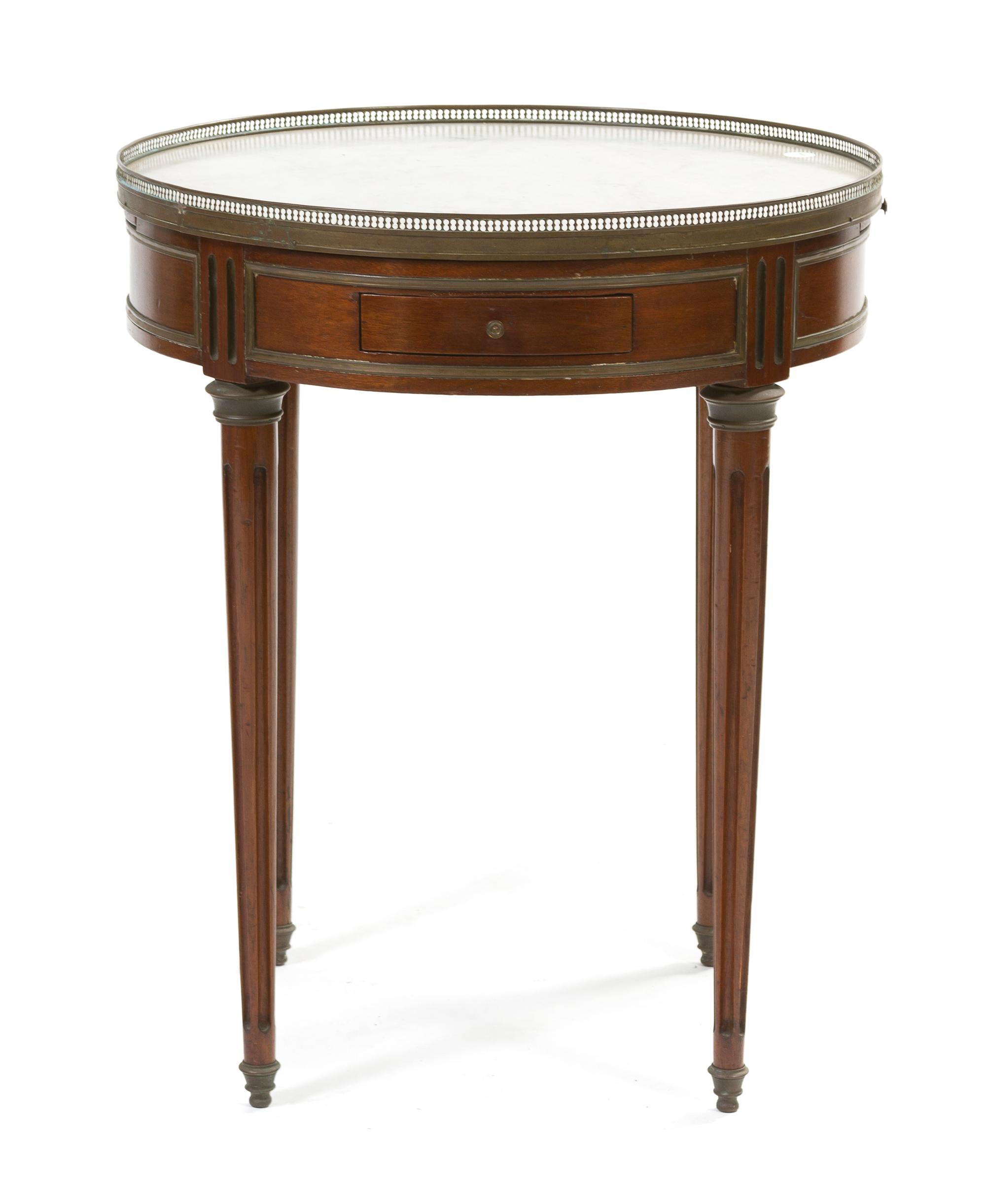 A Louis XVI Style Mahogany Bouillotte Table, Height 28 1/4 x diameter 23 1/2 inches.