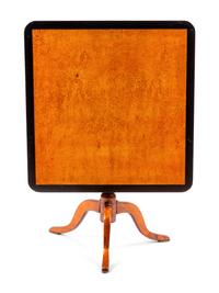 A Swedish Parcel Ebonized Birch Tilt-Top Table