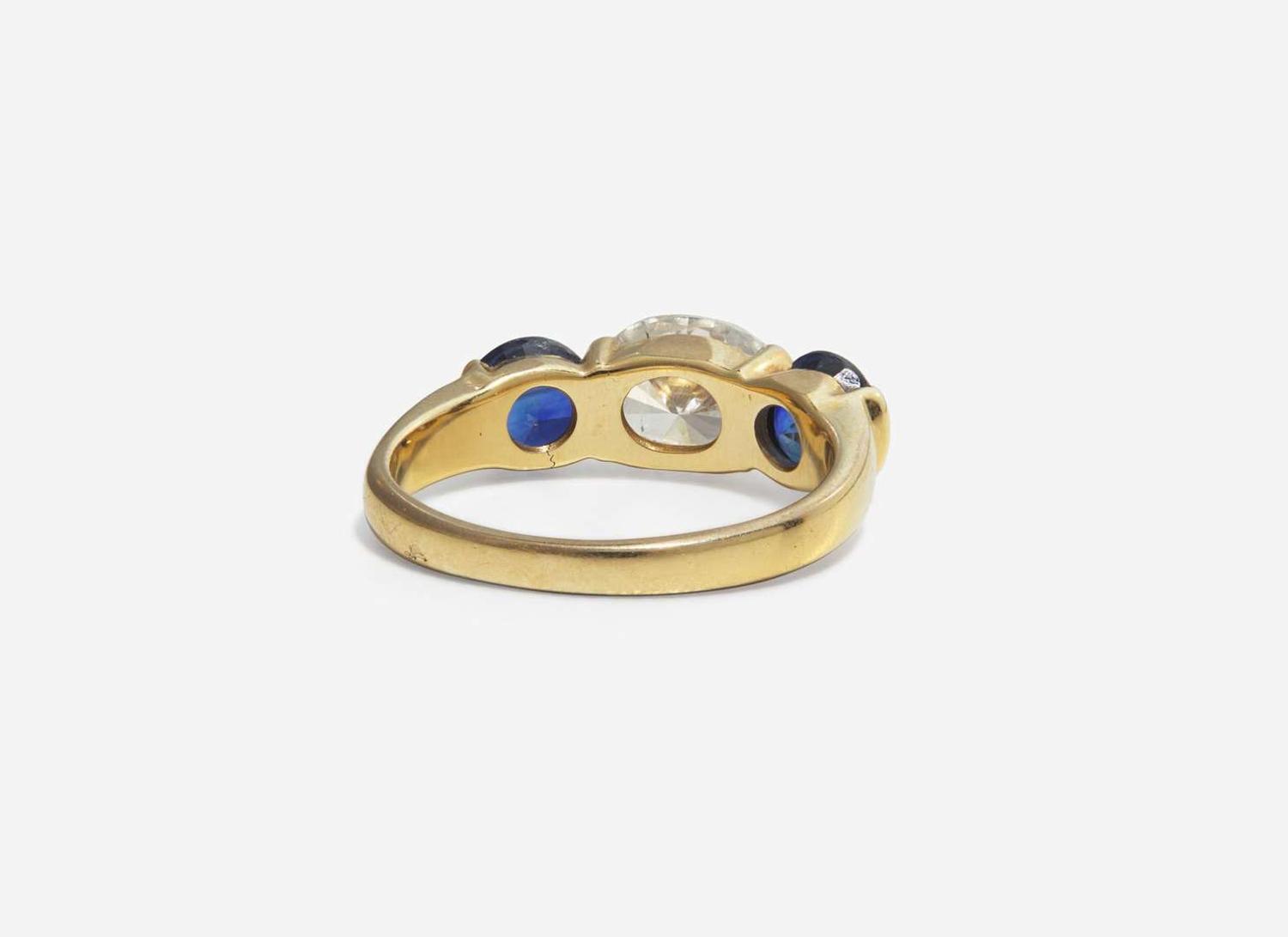 A Three-Stone Diamond and Sapphire Ring