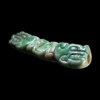 A Maya Jade Serpent Pendant