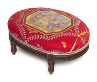 A Louis XVI Style Carved Armchair and Stool with Fortuny Upholstery