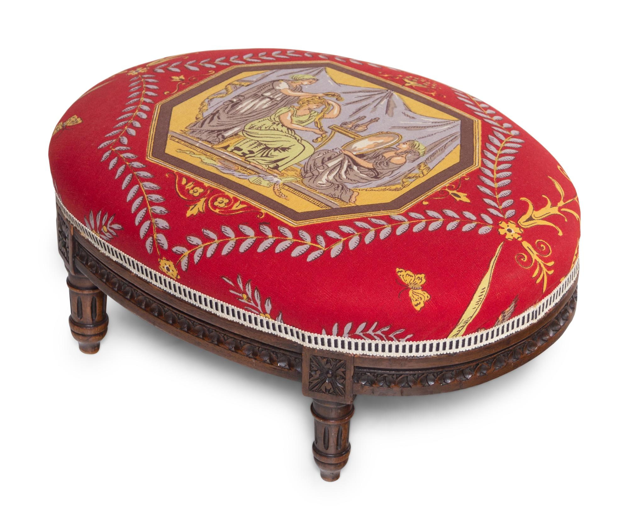 A Louis XVI Style Carved Armchair and Stool with Fortuny Upholstery