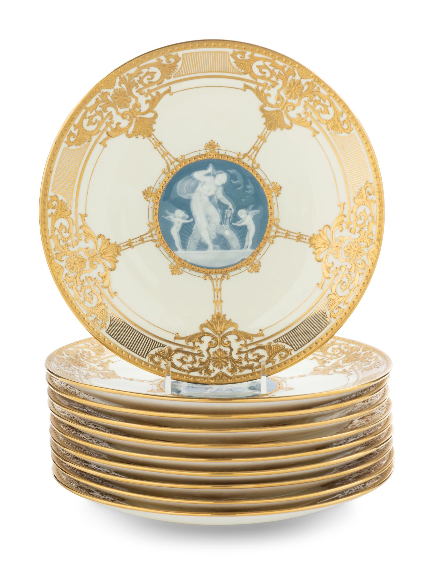 A Set of Ten Mintons Pâte-sur-Pâte Parcel-Gilt Porcelain Dinner Plates
