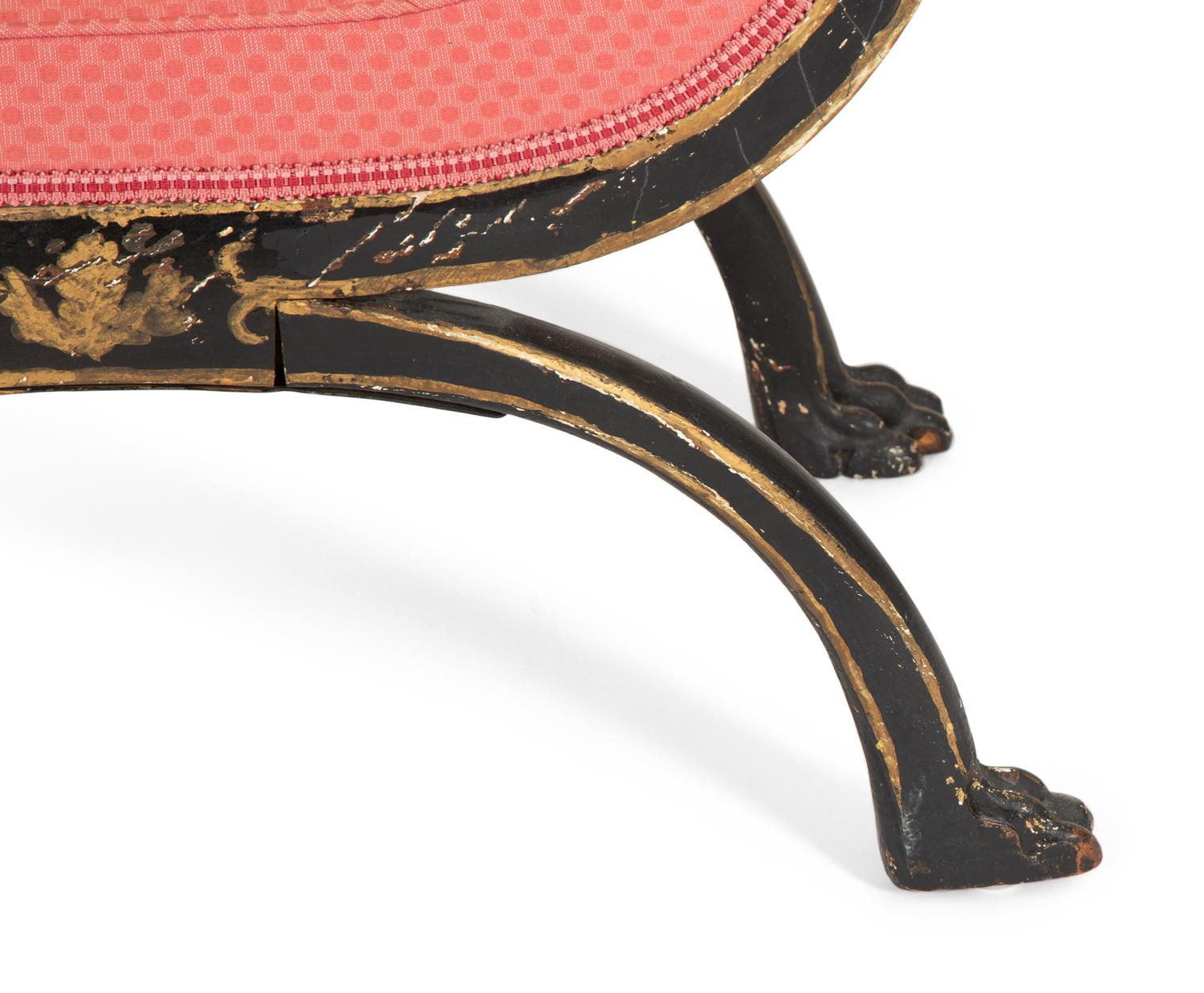 A Regency Style Black Painted and Parcel Gilt Curule Bench