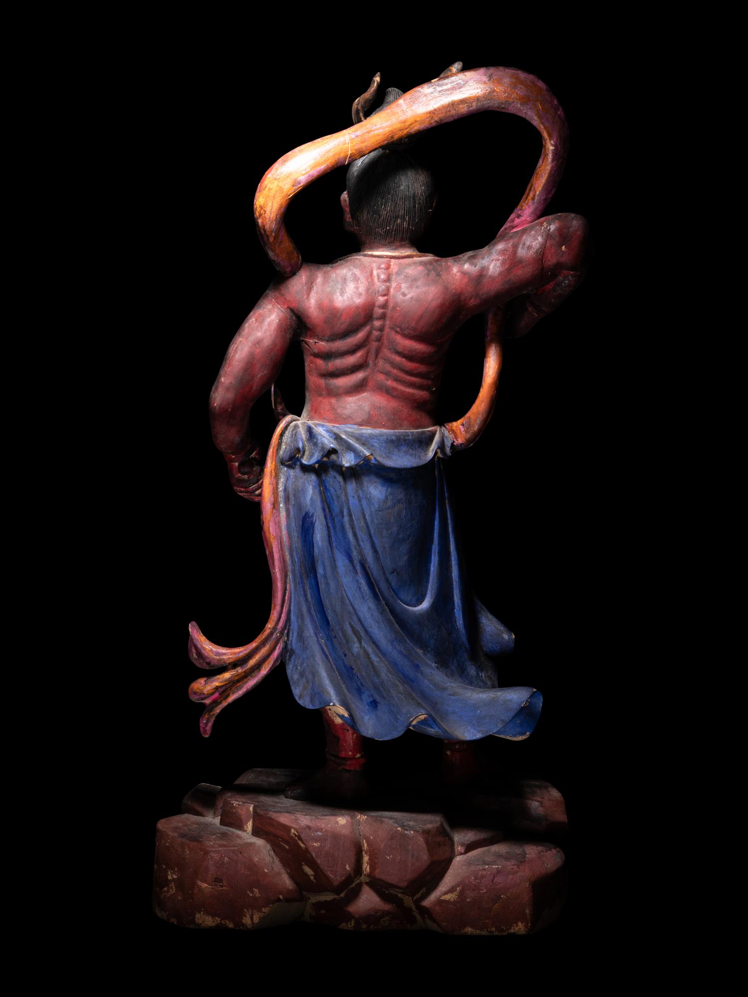 A Chinese Painted Wood Figure of a Guardian