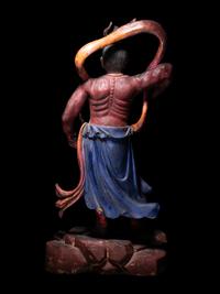 A Chinese Painted Wood Figure of a Guardian