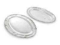 A Near Pair of German Silver Serving Platters