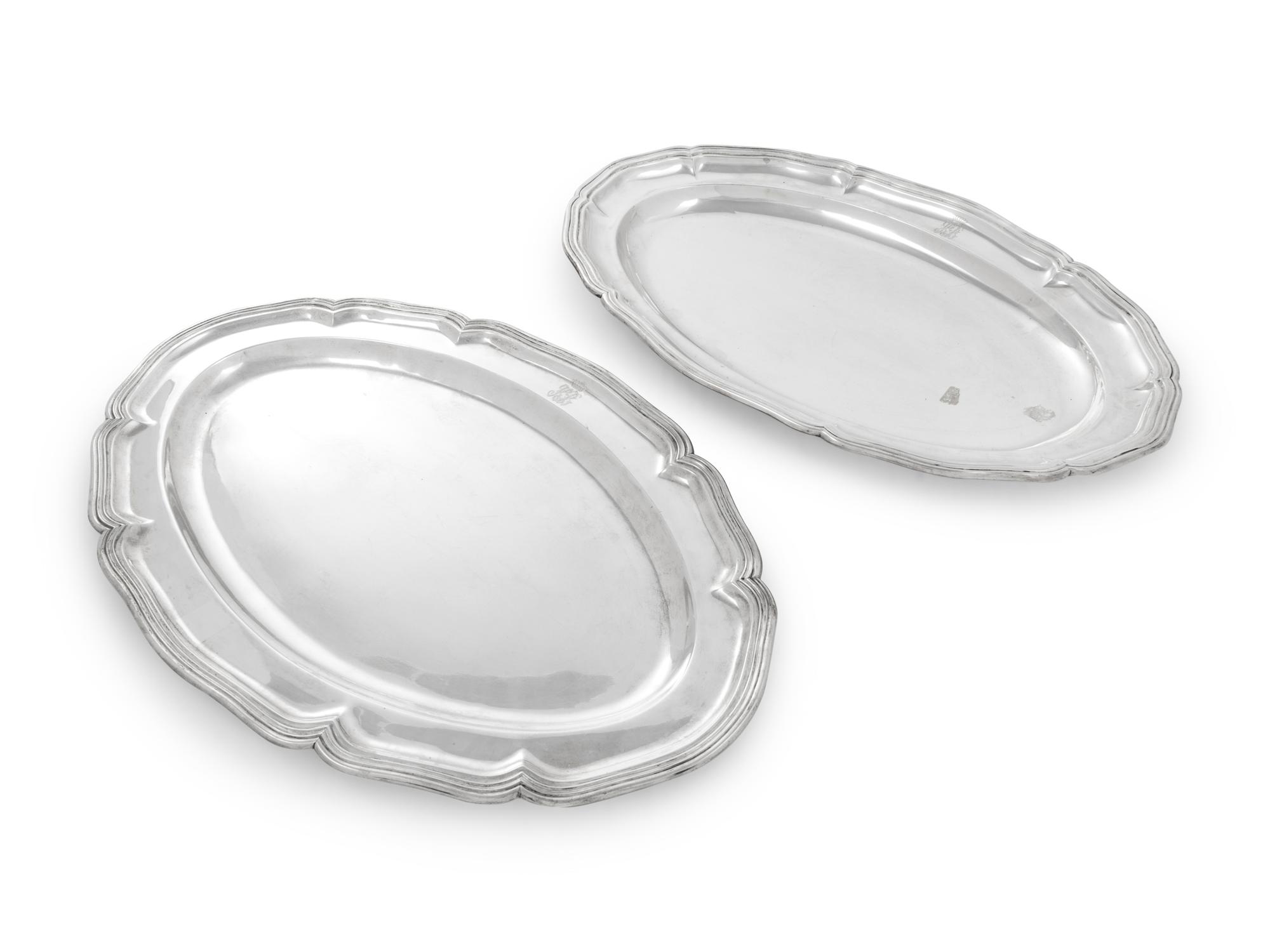A Near Pair of German Silver Serving Platters
