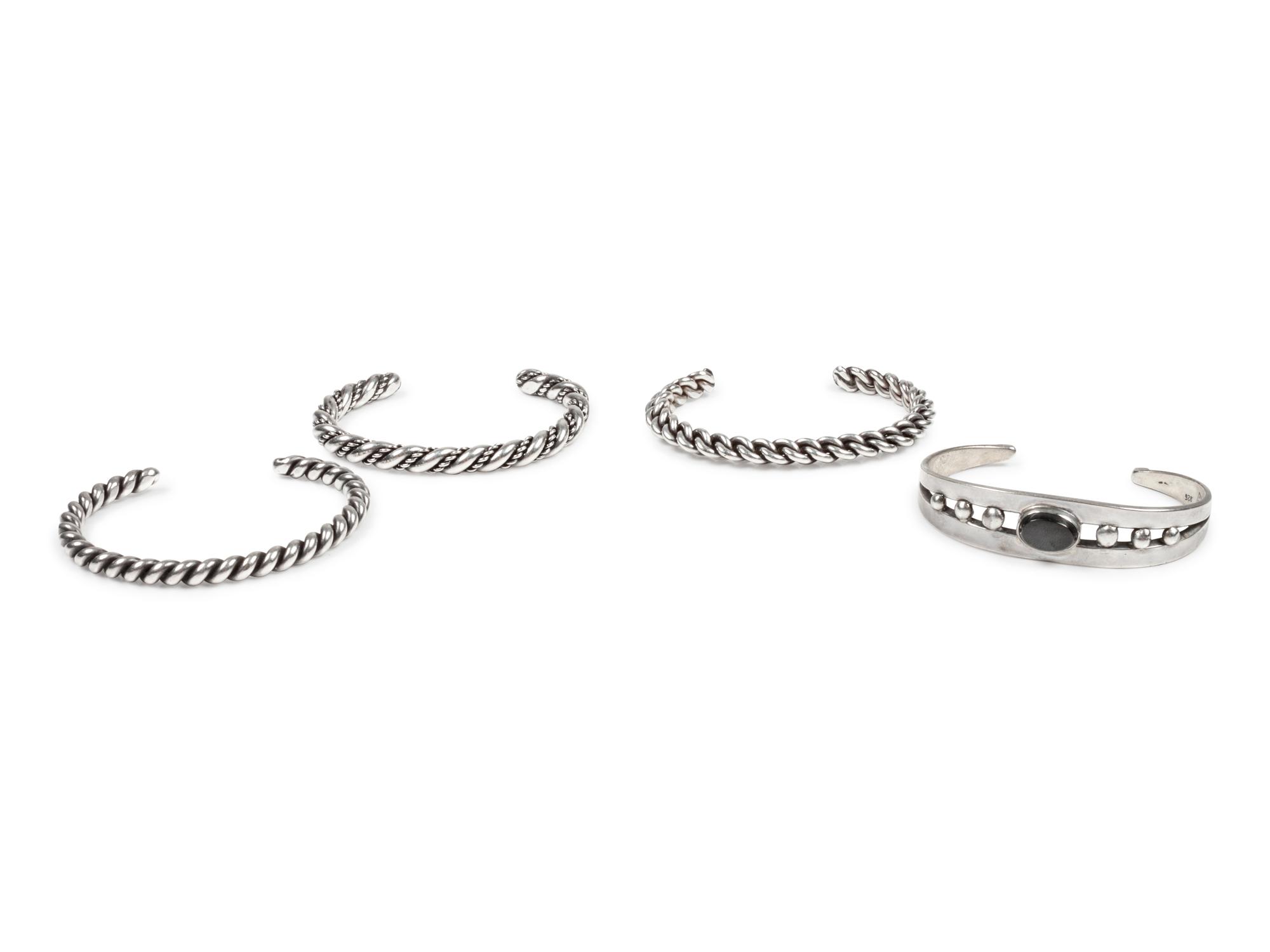 Four Southwestern Silver Cuff Bracelets
