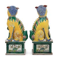 A Large Pair of Chinese Famille Jaune Porcelain Figures of Fu Lions