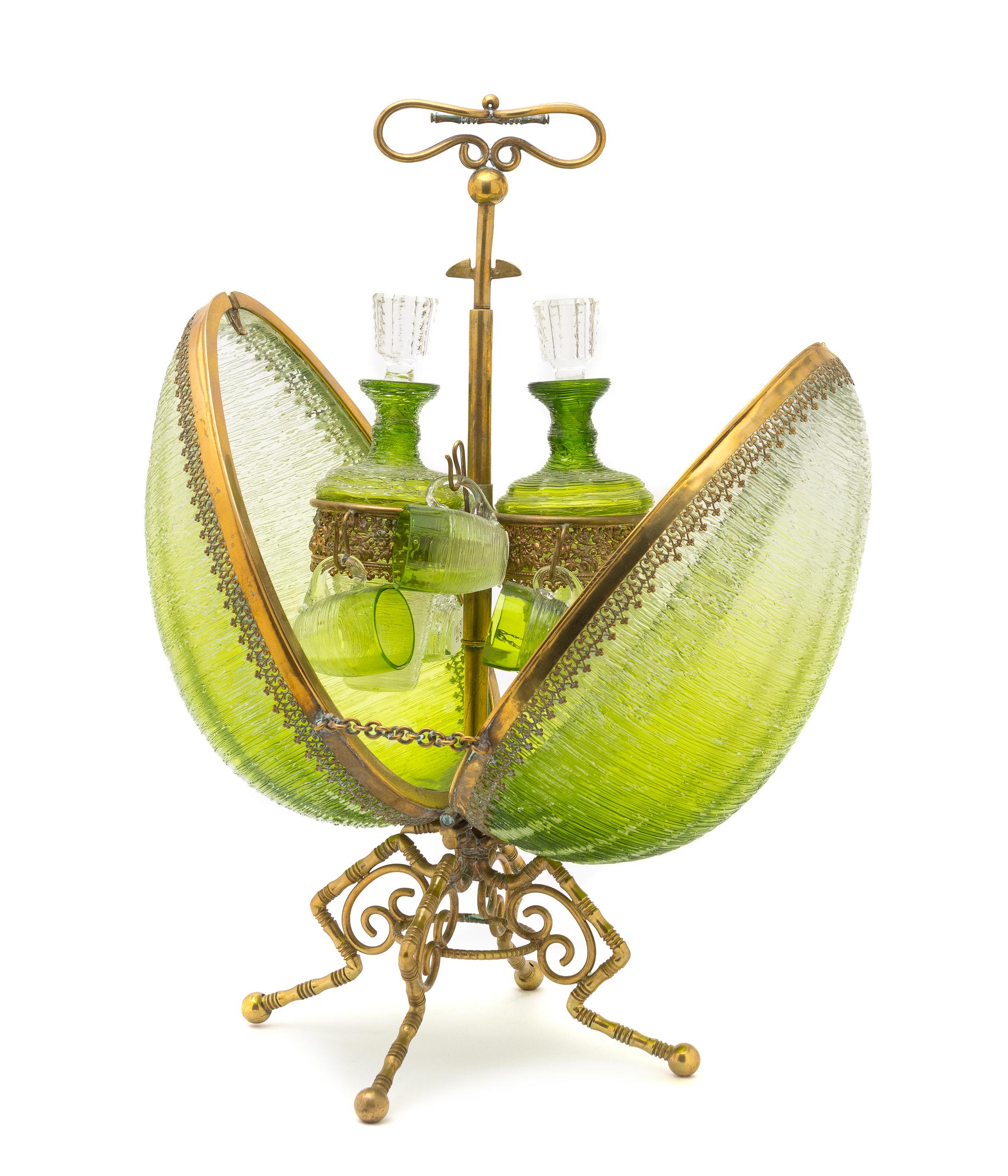 A Continental Gilt Bronze and Leaded Glass Decanter Set, Height overall 17 1/4 inches.