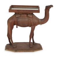 An Anglo-Indian Carved Wood Camel-Form Side Table