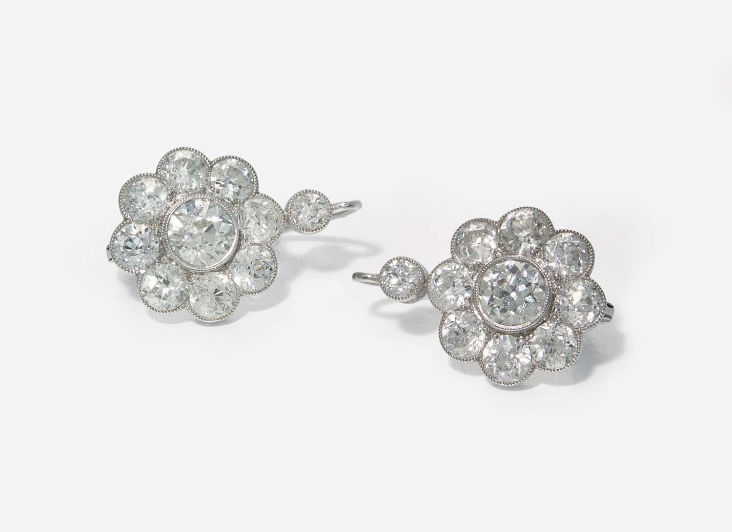 A Pair of 14K White Gold and Diamond Earrings