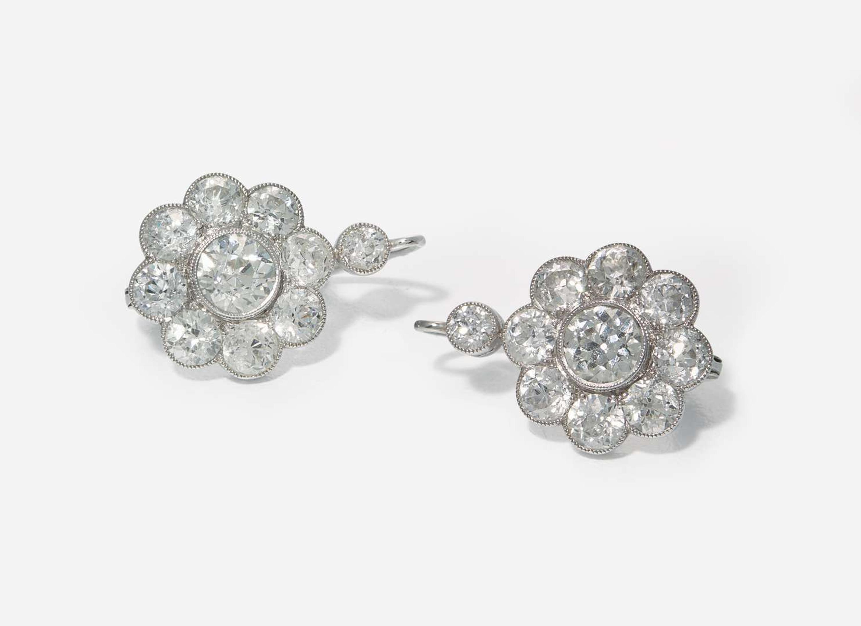 A Pair of 14K White Gold and Diamond Earrings