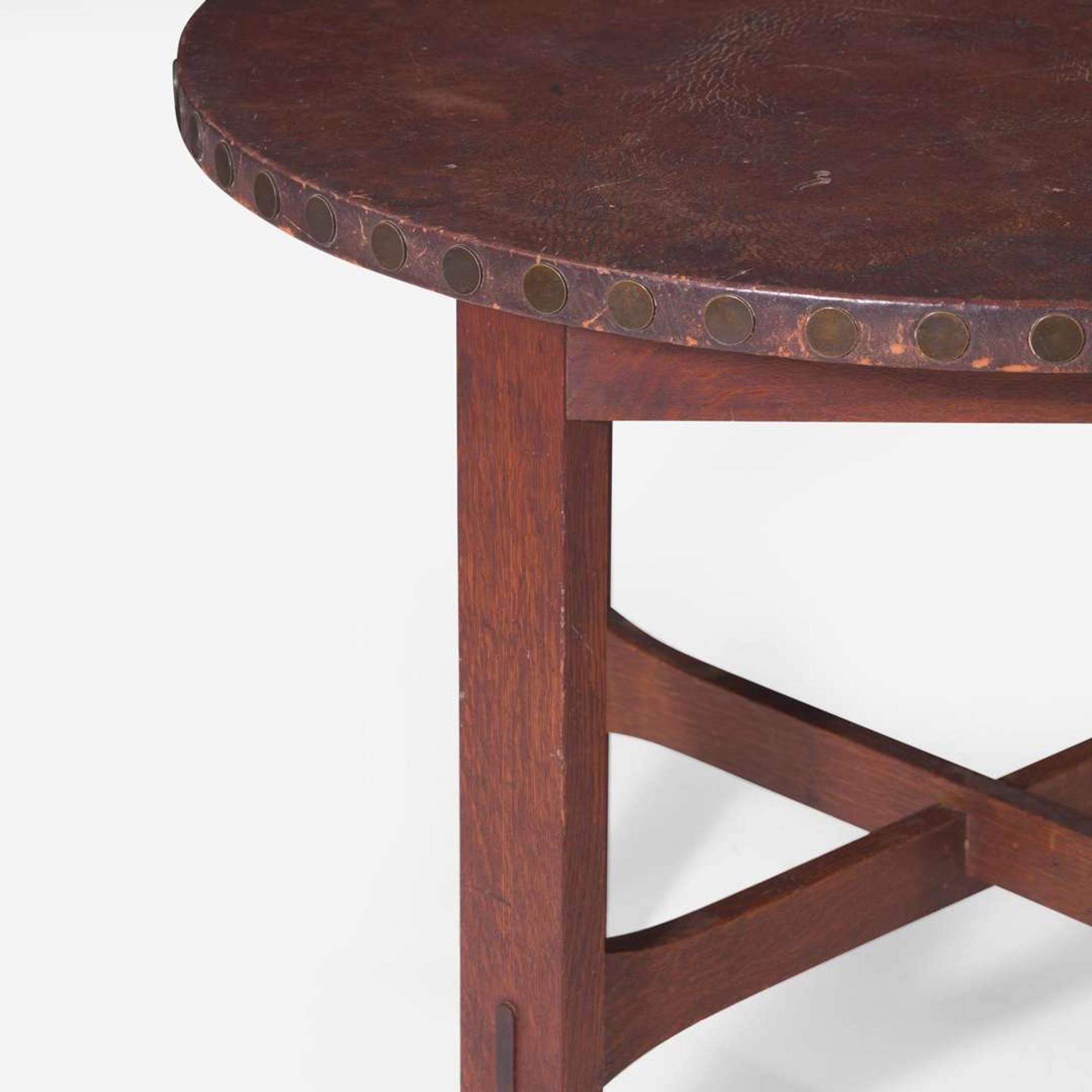 Stickley Brothers (American, active 1891-1954) A Fall-Front Desk, Library Table, and Lamp Table Model No. 180, USA, circa 1905