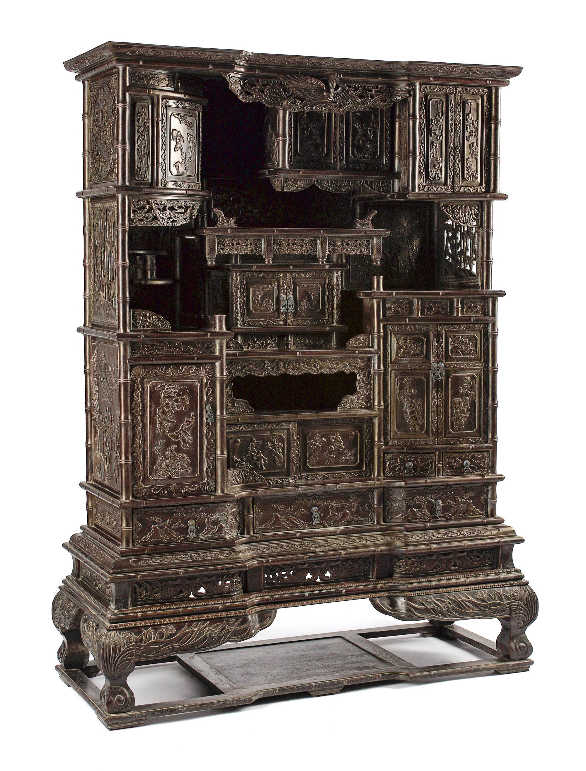 A Pair of Chinese Export Hardwood Whatnot Cabinets