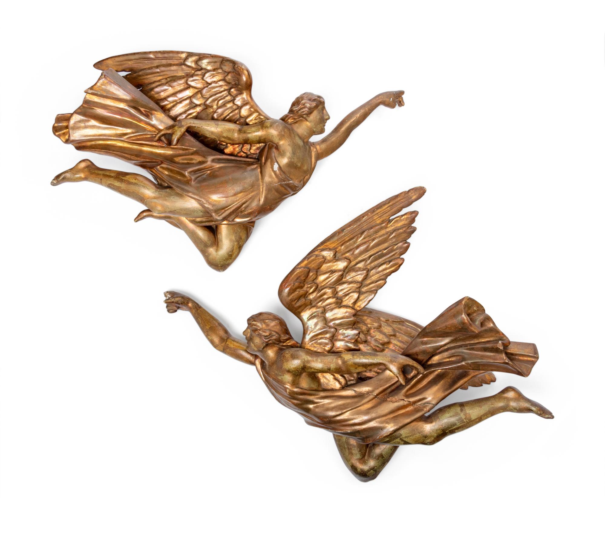 A Pair of Continental Carved Angel Figures