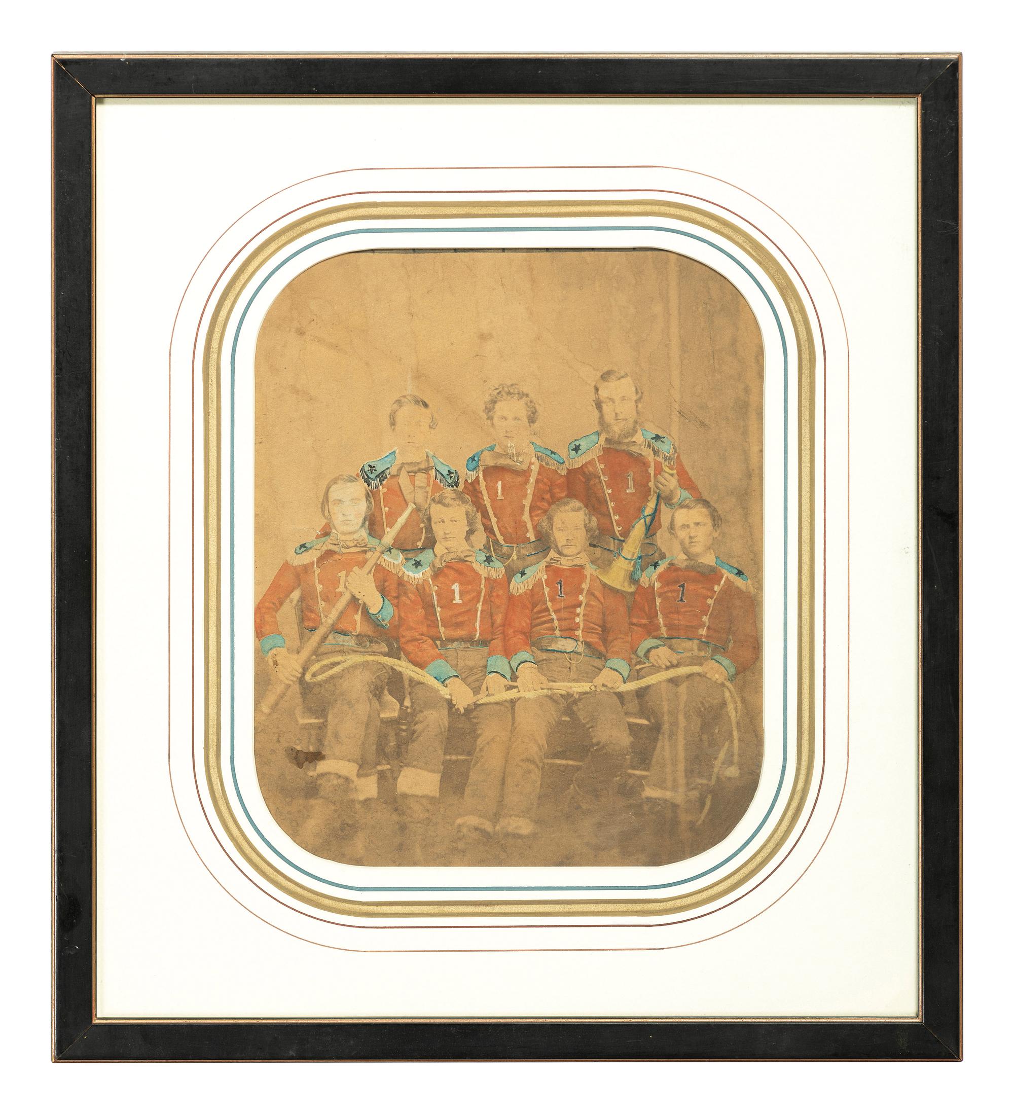 [EARLY PHOTOGRAPHY]. Early salted paper photo of seven firefighters.