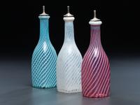 Three Swirl Opalescent Glass Barber Bottles