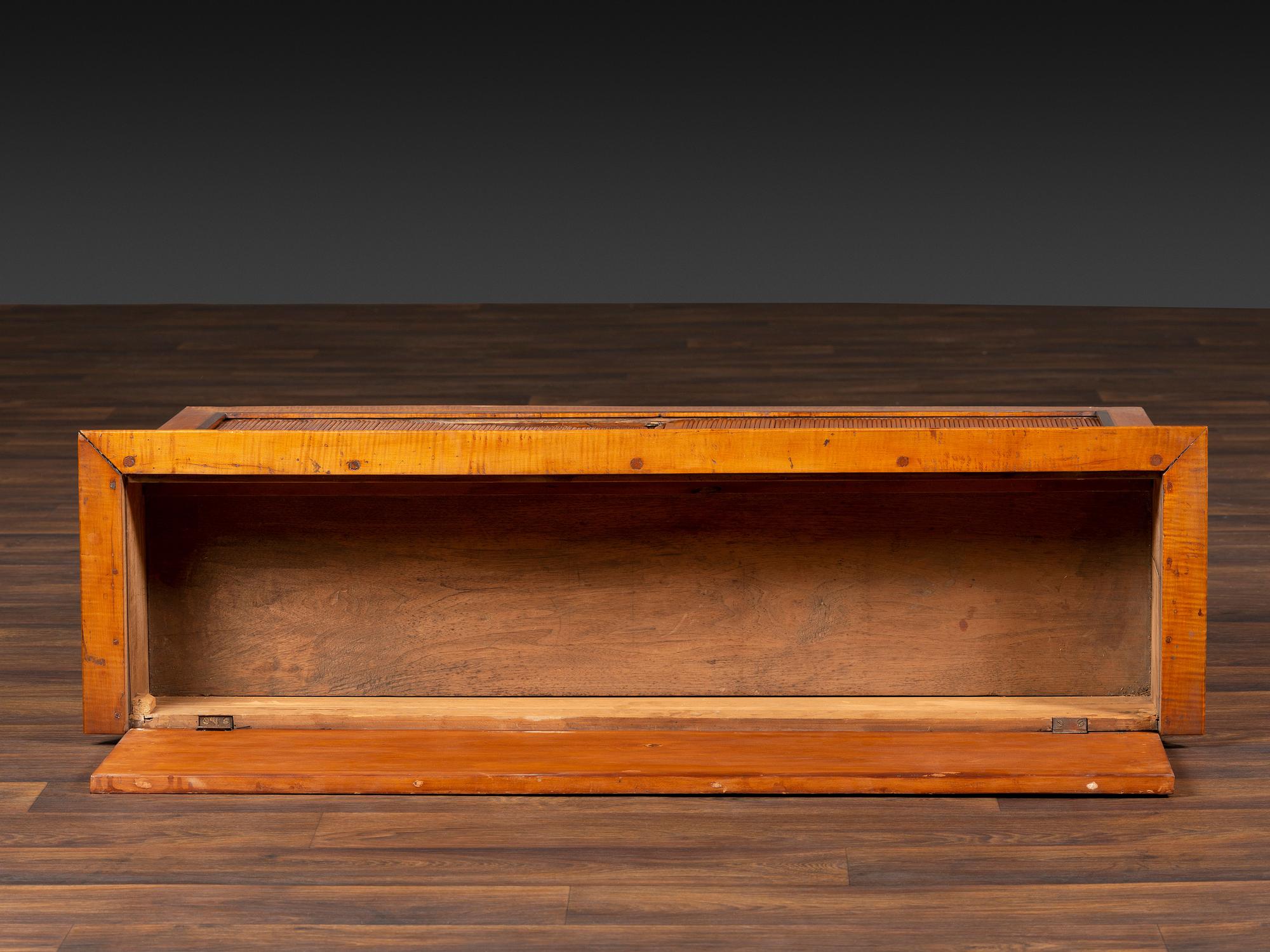 A Federal Inlaid Bird's Eye Maple and Mahogany Tambour Writing Desk