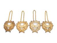 Four English Silver-Gilt Liquor Tags