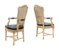 A Pair of Louis XV Style Painted and Caned Fauteuils
