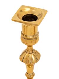 A Group of Eight English Brass Candlesticks