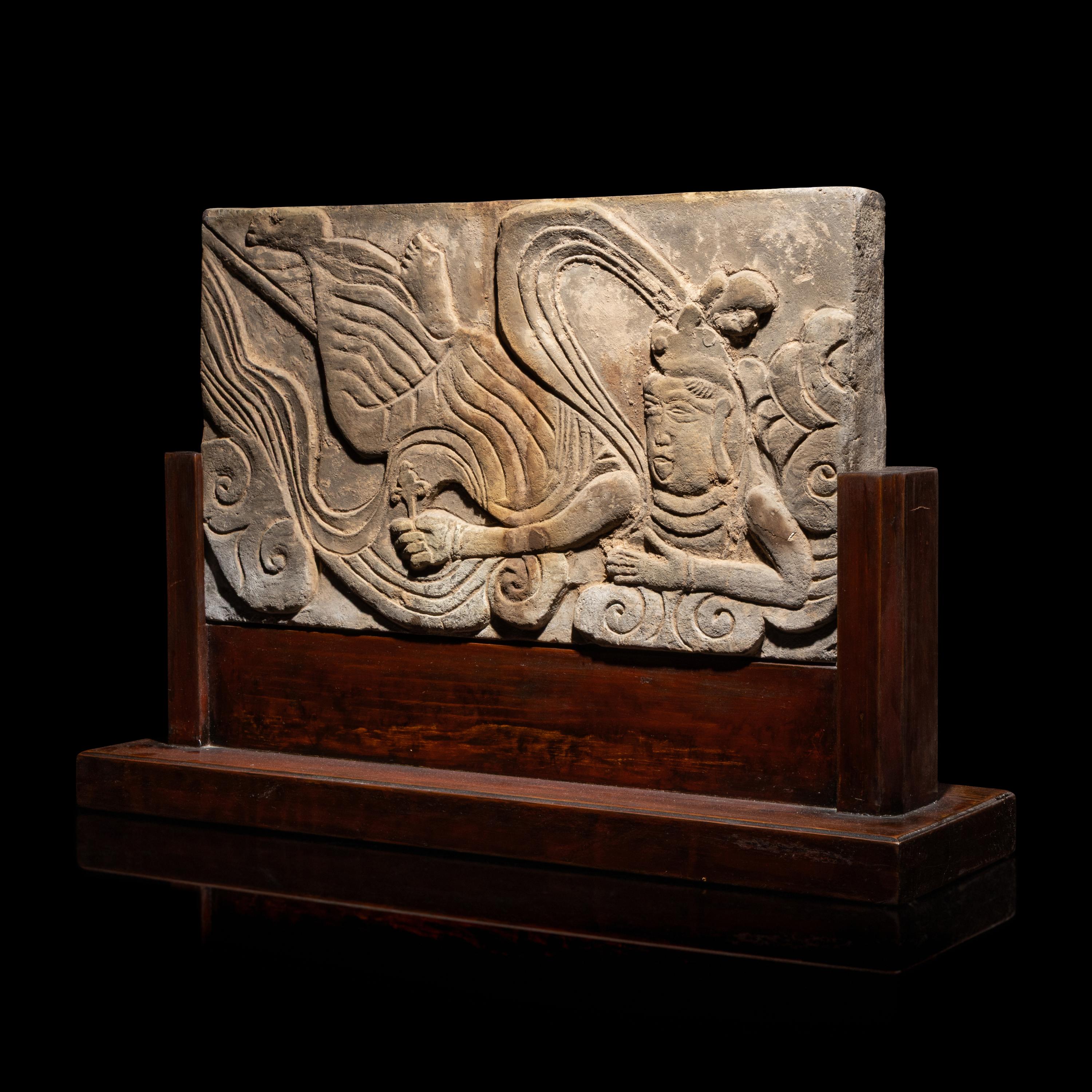 A Chinese Carved Terracotta 'Apsara' Panel, Liao Dynasty or Later — 遼或以後 磚雕祥云飞天