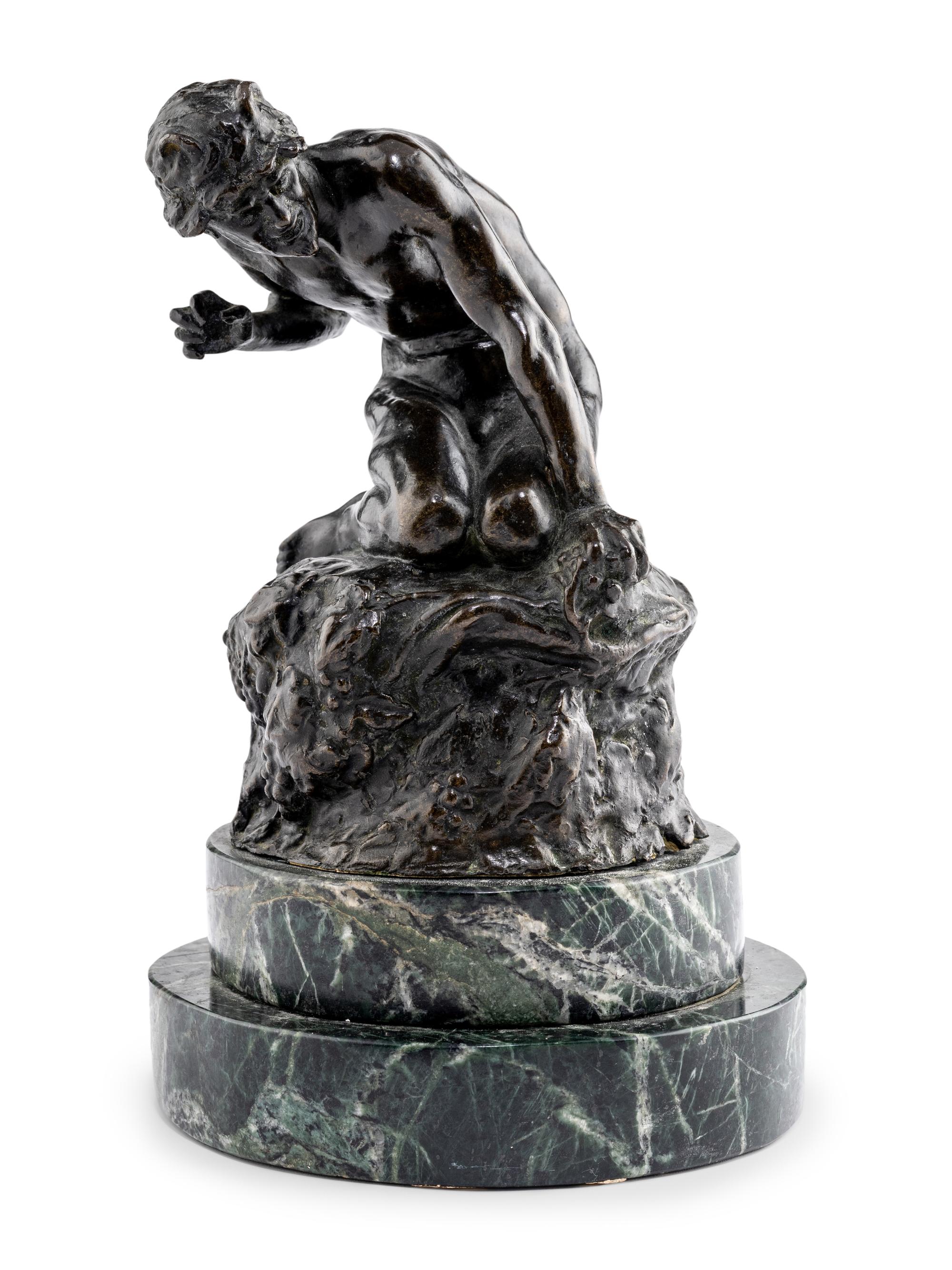 A Bronze Figure of Satyr on the Rocks