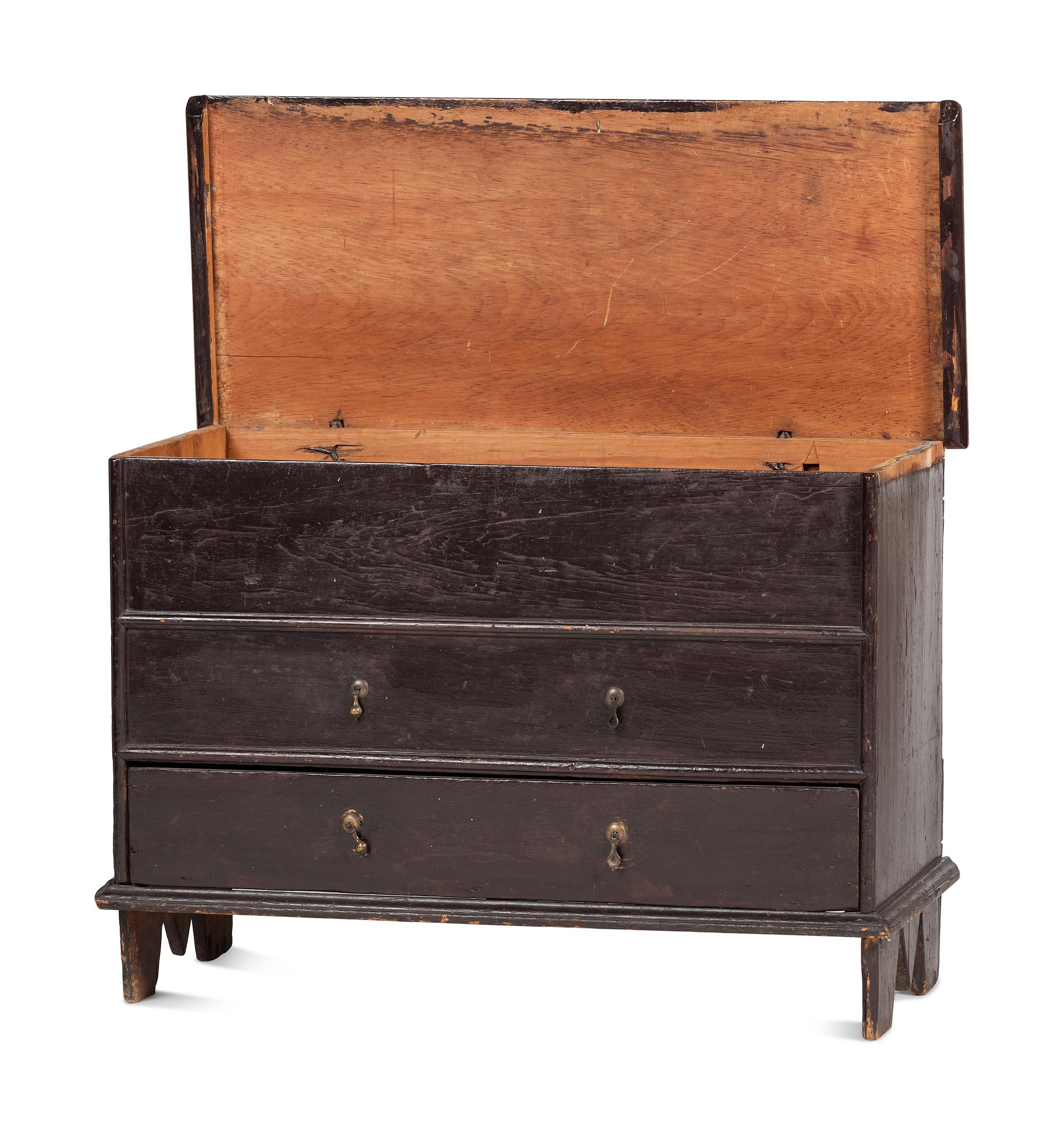 A Rare Pilgrim Century Black Painted Pine One-Drawer 'M' Chest