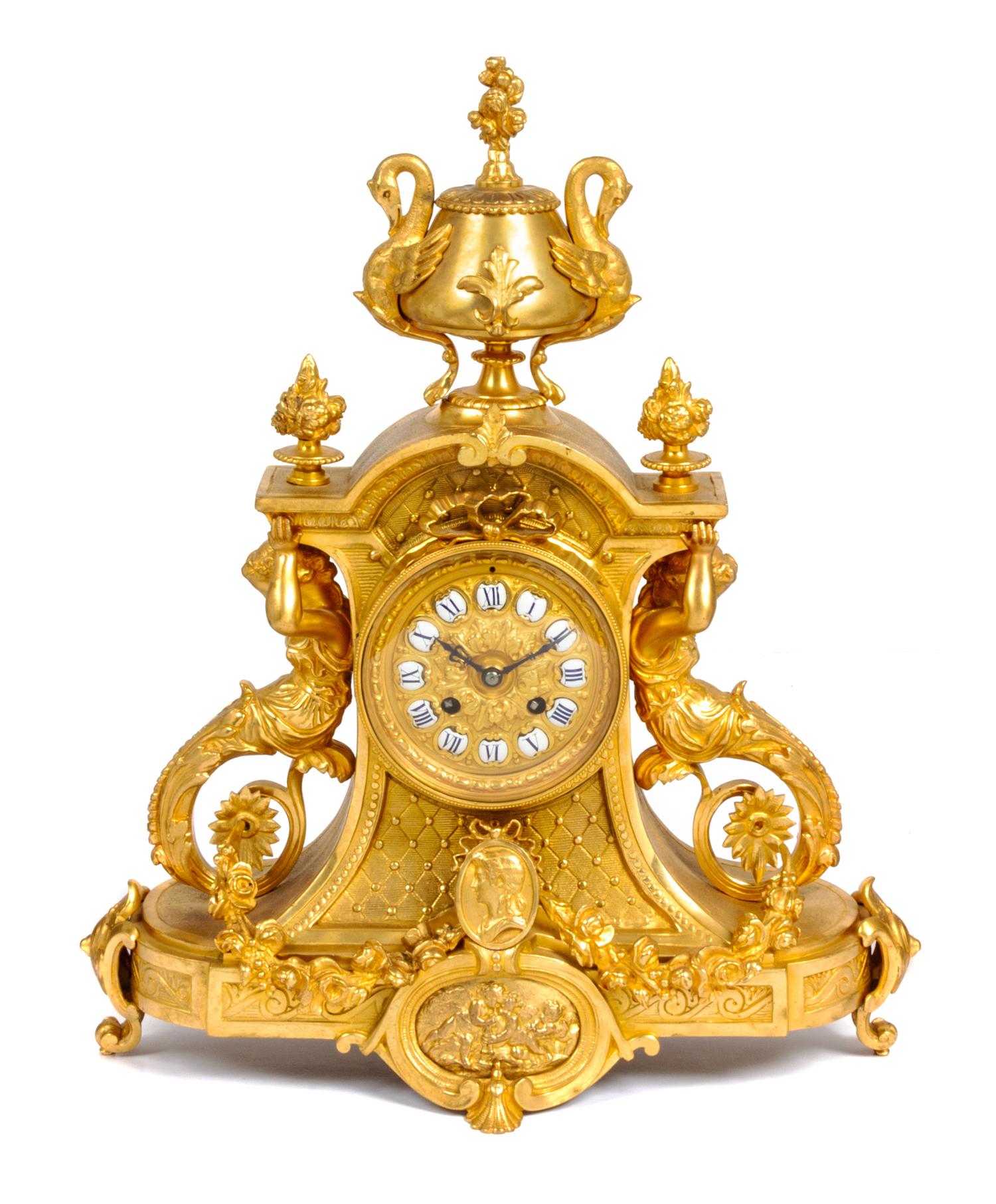 A Napoleon III Style Gilt Bronze Clock Garniture Height 20 inches. — C. CELLIER, PARIS, LATE 19TH CENTURY
