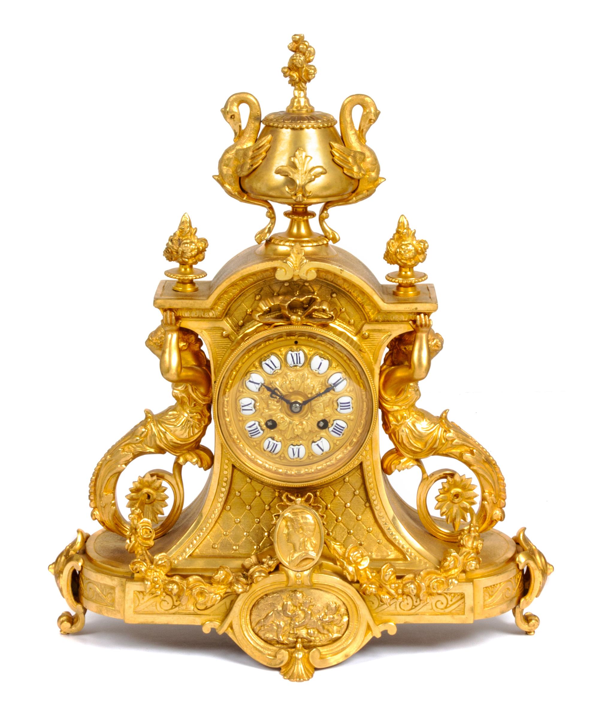 A Napoleon III Style Gilt Bronze Clock Garniture Height 20 inches. — C. CELLIER, PARIS, LATE 19TH CENTURY