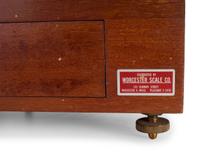 A Central Scientific Co. Scale, an Ingraham Eight-Day Movement Mantle Clock and Framed Salesmen Samples of Blue Grass Axes