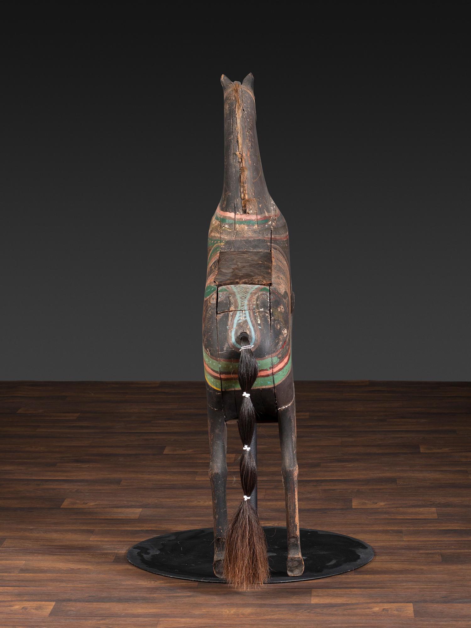 An American Glass Inset, Carved and Painted Pine Carousel Horse