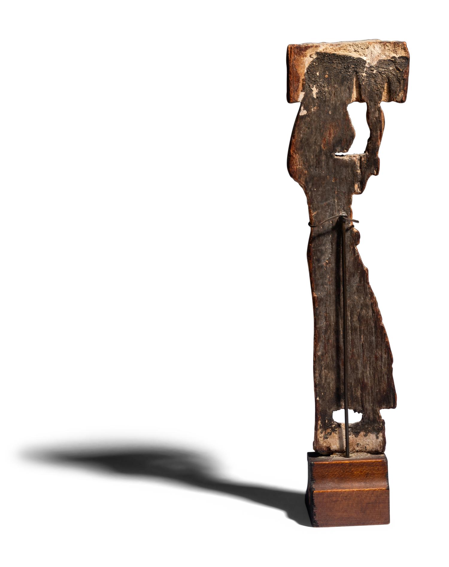An Egyptian Wood Offering Bearer