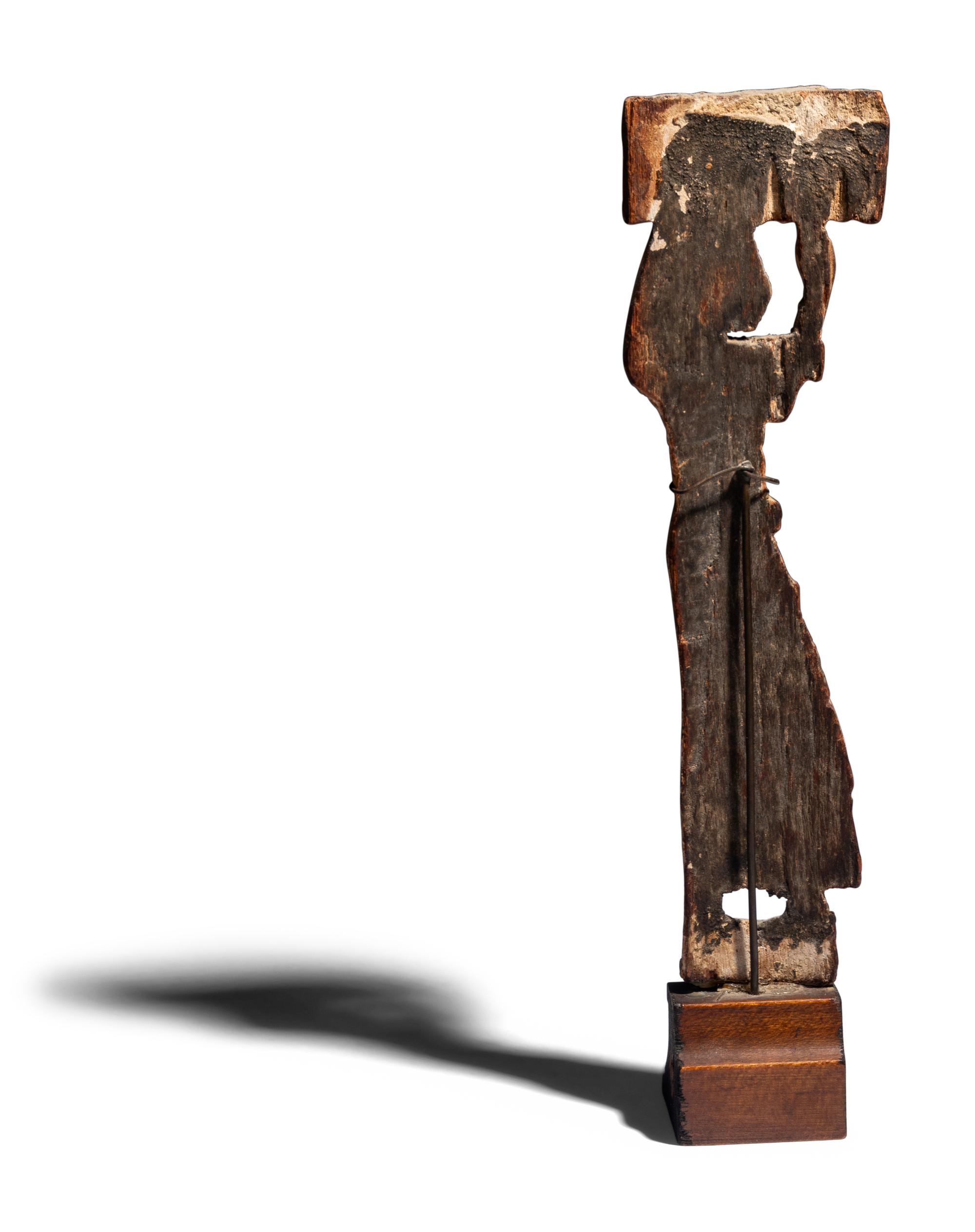An Egyptian Wood Offering Bearer