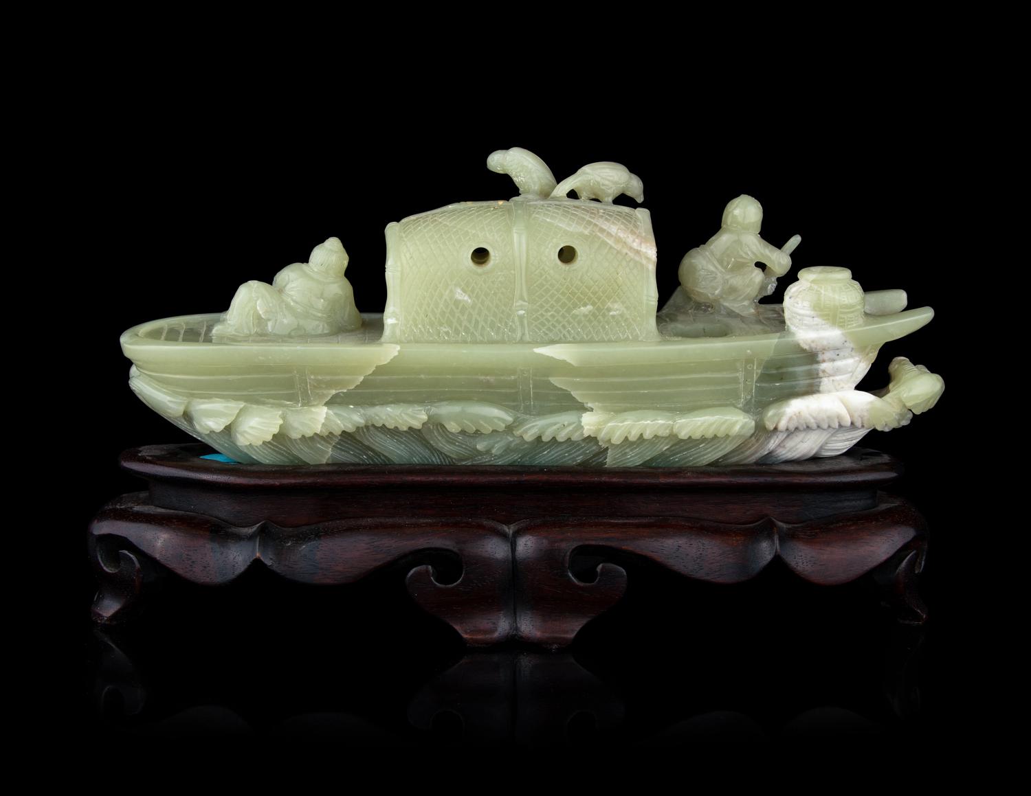A Chinese Celadon Jade Boat