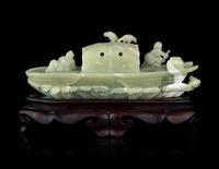A Chinese Celadon Jade Boat