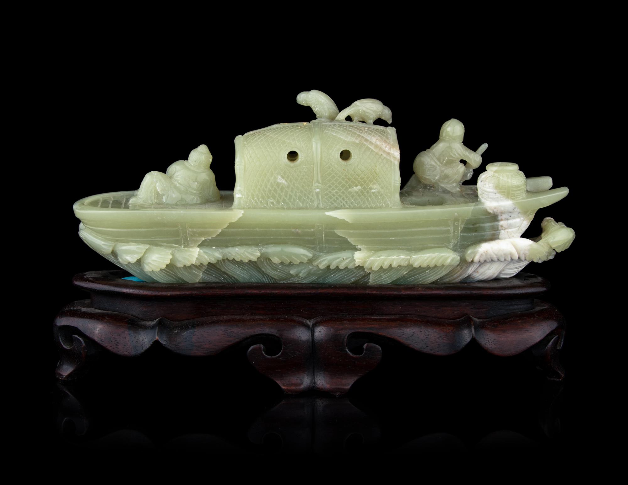 A Chinese Celadon Jade Boat