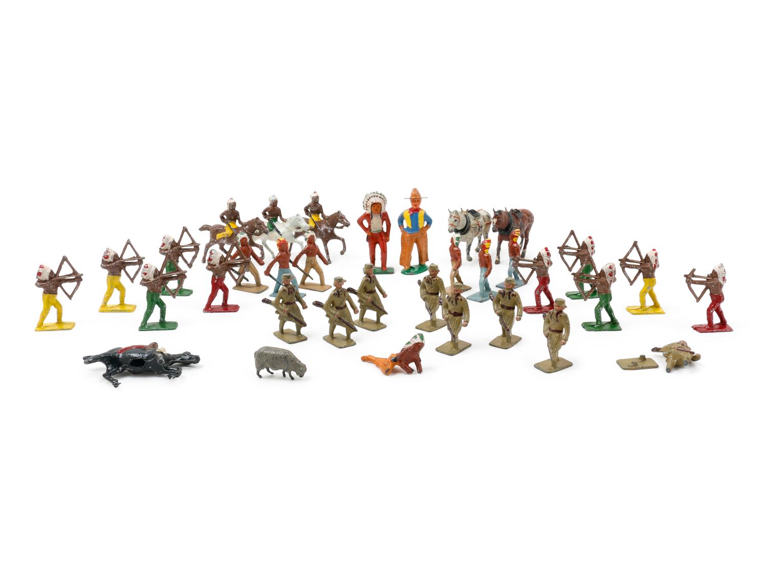 A Group of Painted Metal Native American and Frontiersman Toy Soldiers