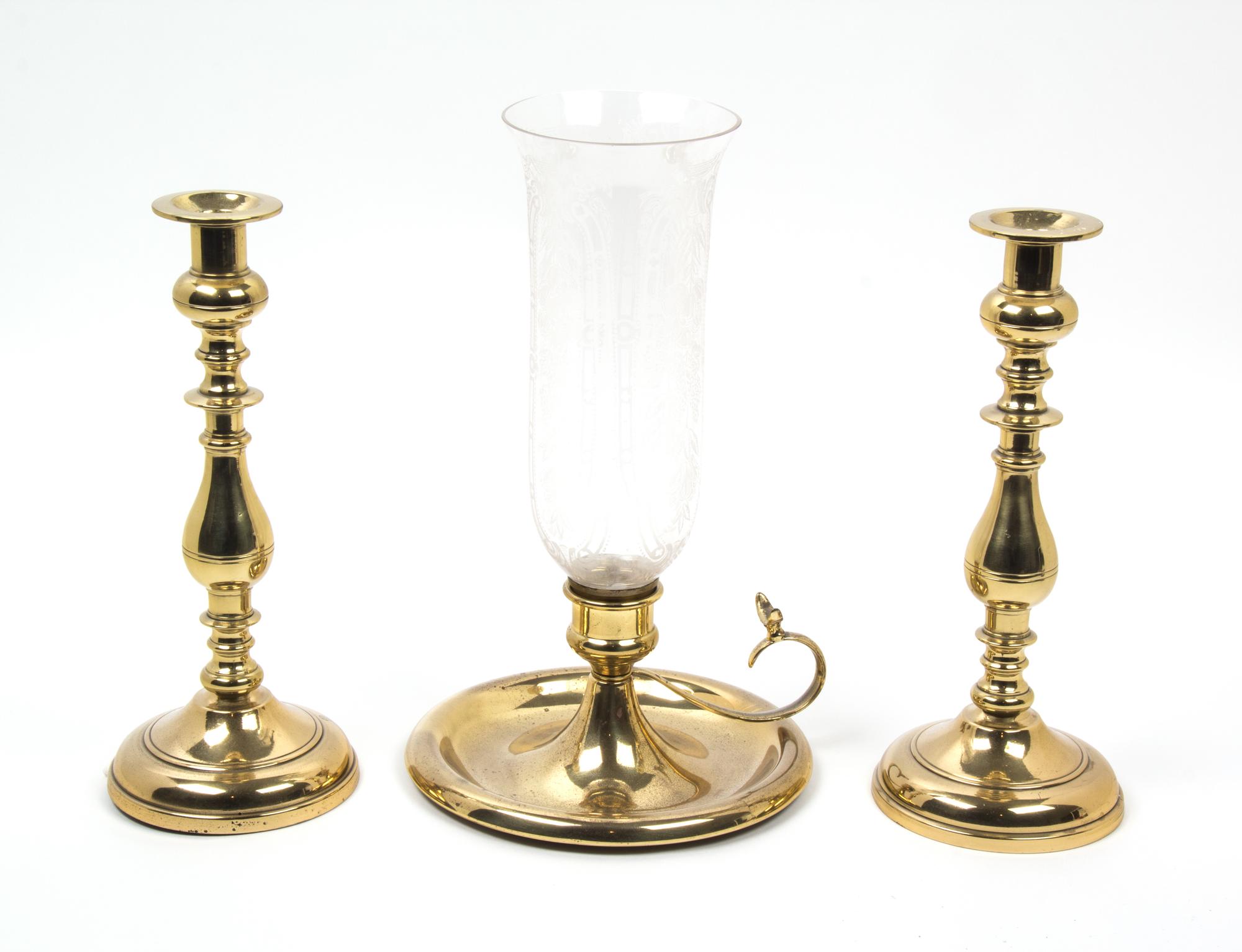 A Group of Brass Candlesticks Height of tallest 13 1/2 inches. — 20TH CENTURY