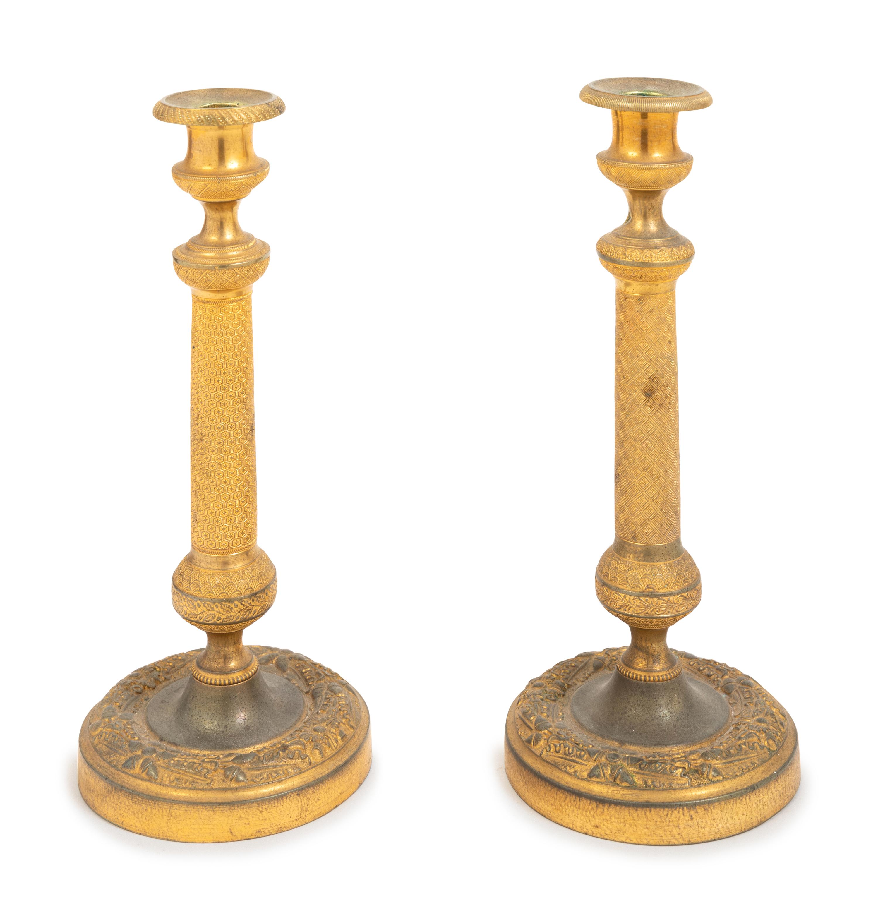 A Pair of Empire Style Gilt Bronze Candlesticks