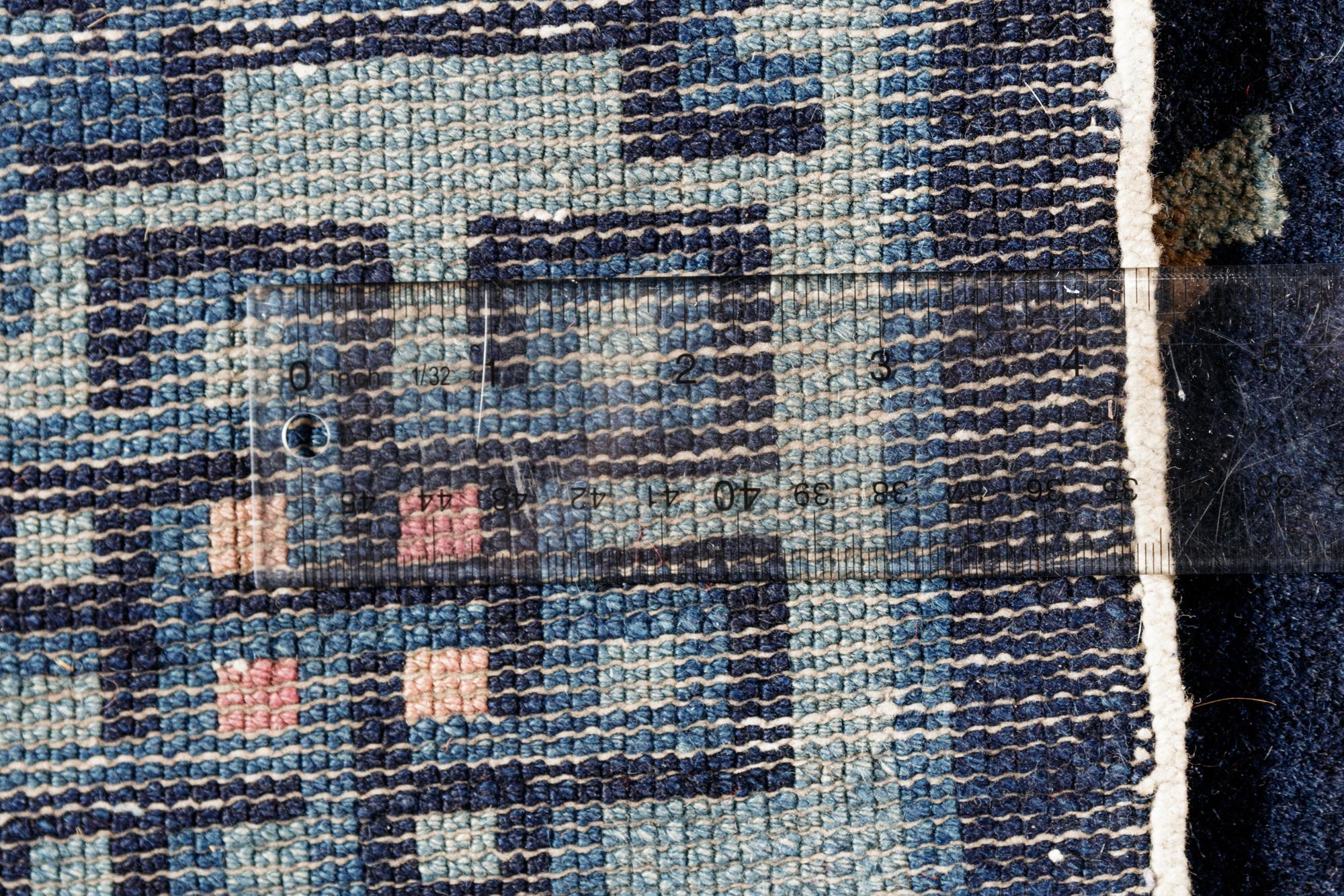 Two Chinese Blue Ground Pile Rugs
