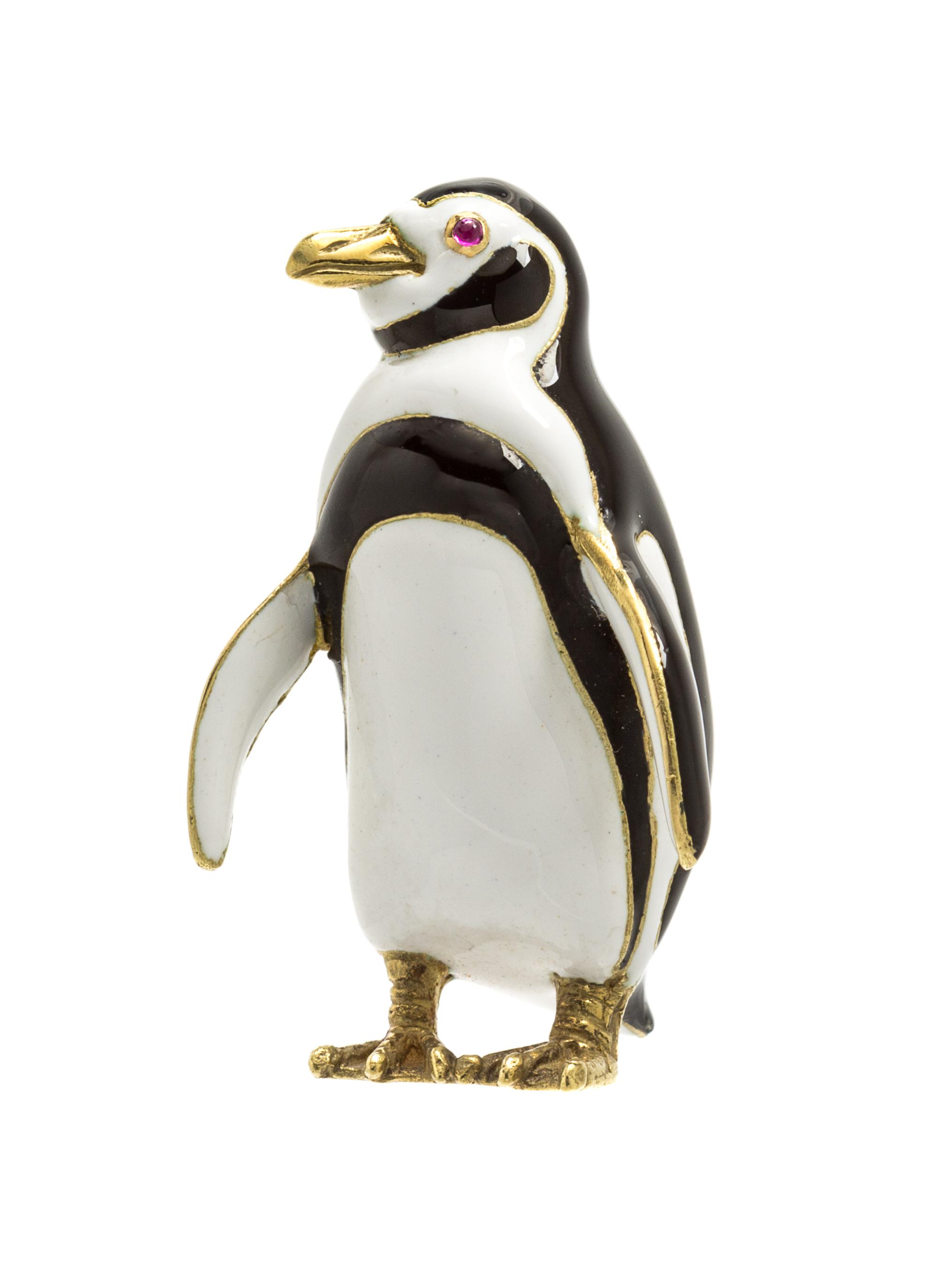 An 18 Karat Yellow Gold, Polychrome Enamel and Ruby Penguin Brooch, Tiffany & Co., 12.00 dwts.
