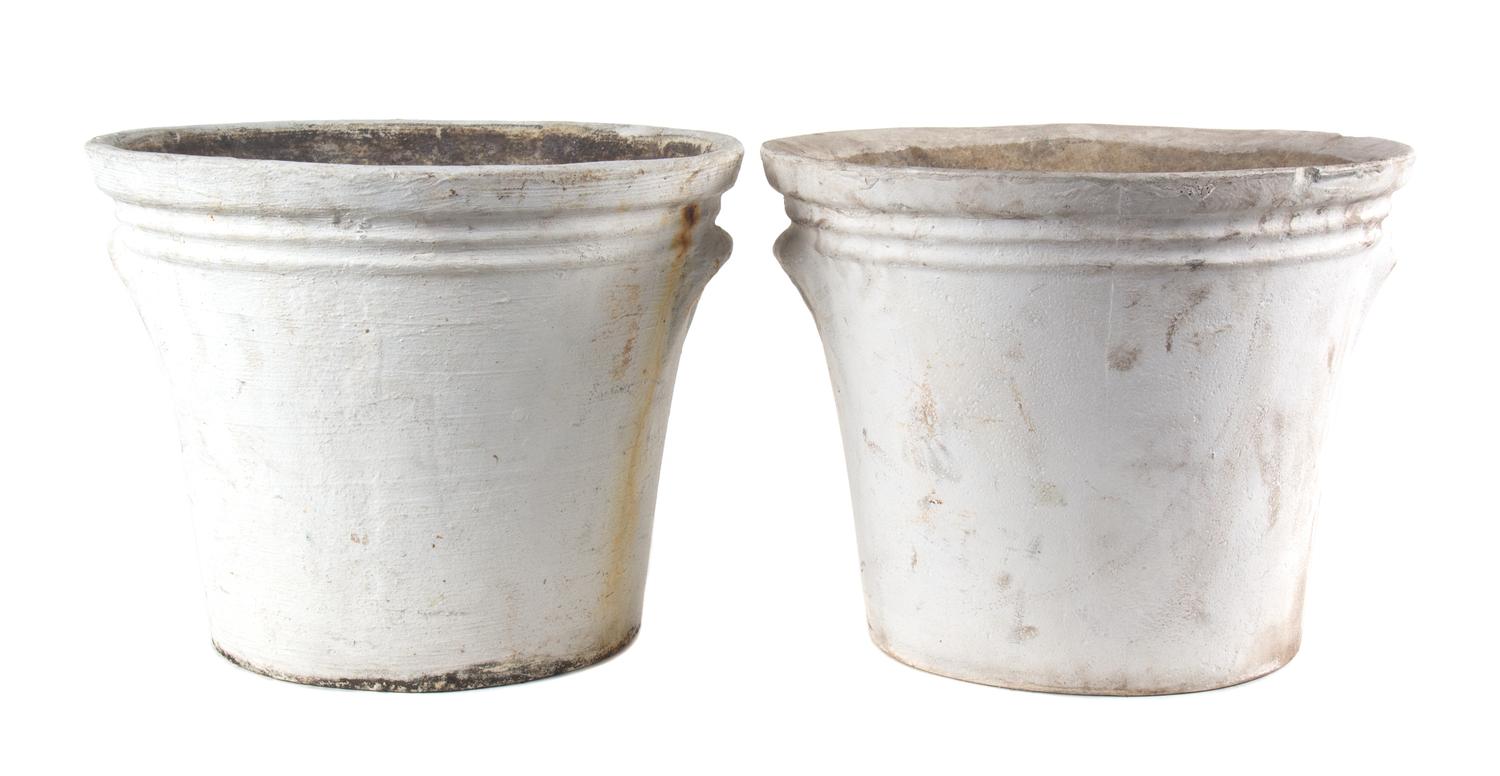 A Group of Five Concrete Planters Height of larger 15 1/2 inches x diameter 21 inches.