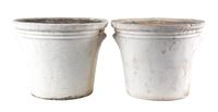 A Group of Five Concrete Planters Height of larger 15 1/2 inches x diameter 21 inches.